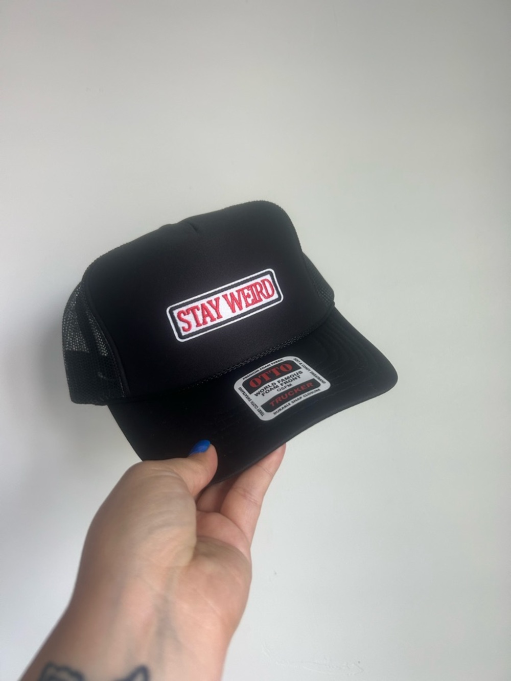Black 'Stay Weird' Trucker Hat